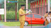 ASISSTENSATUBLSL Asisten I Bidang Pemerintahan dan Kesra Setda Bolsel Alsyafri Kadullah meakili Bupati Iskandar Kamaru Bacakan Pidato Mendukbangga