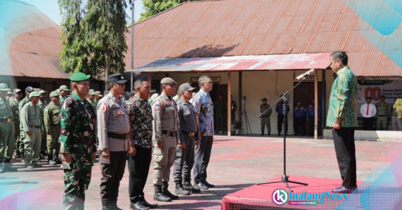 Pengukuhan Satlinmas Kota Kotamobagu Walikota Kotamoabgu saat mengukuhkan Anggota Satlinmas