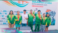 Wakil Walikota juga Ketua KONI Kotamobagu bersama Atlet Cabor Selam saat menerima hadiah
